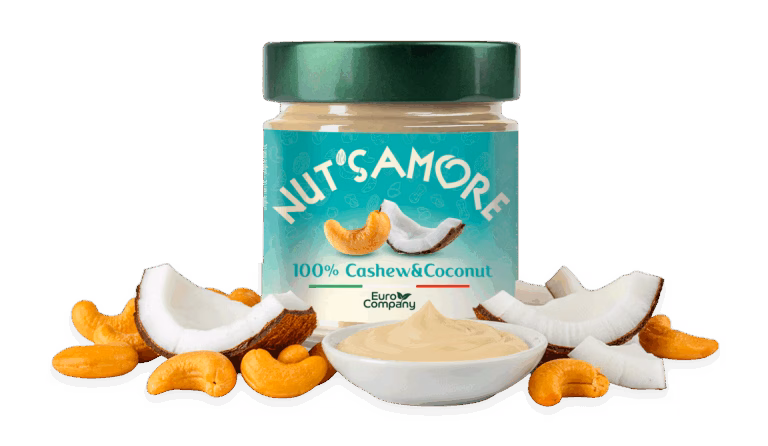 Jar of Nut's amore 100% Cashew & Coconut spread, with scattered ingredients.